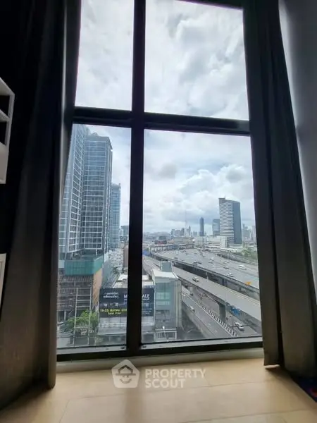 Stunning cityscape view from high-rise apartment window