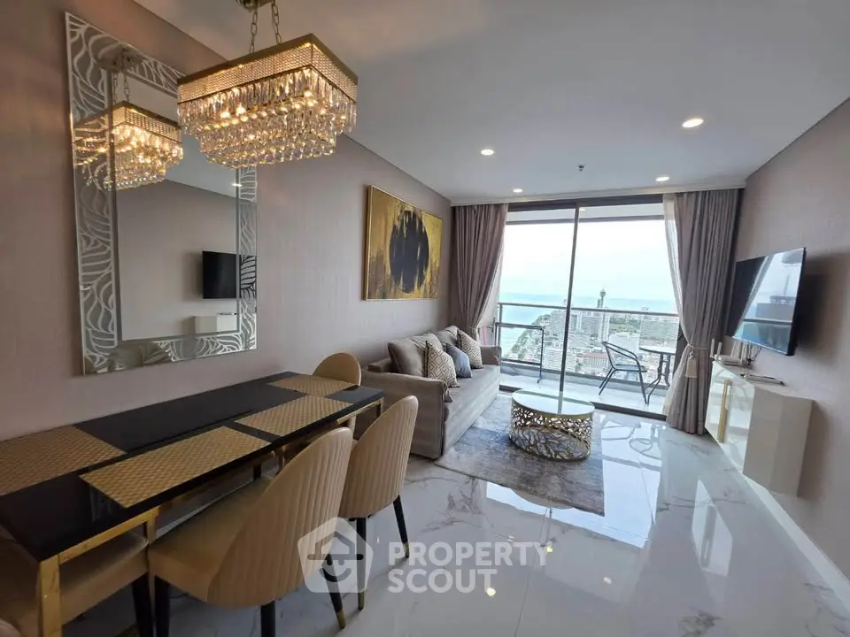 Luxurious living room with elegant decor and stunning city view from balcony.