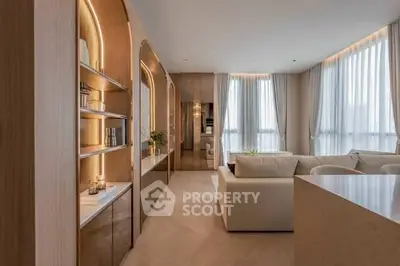 Luxurious modern living room with elegant decor and large windows