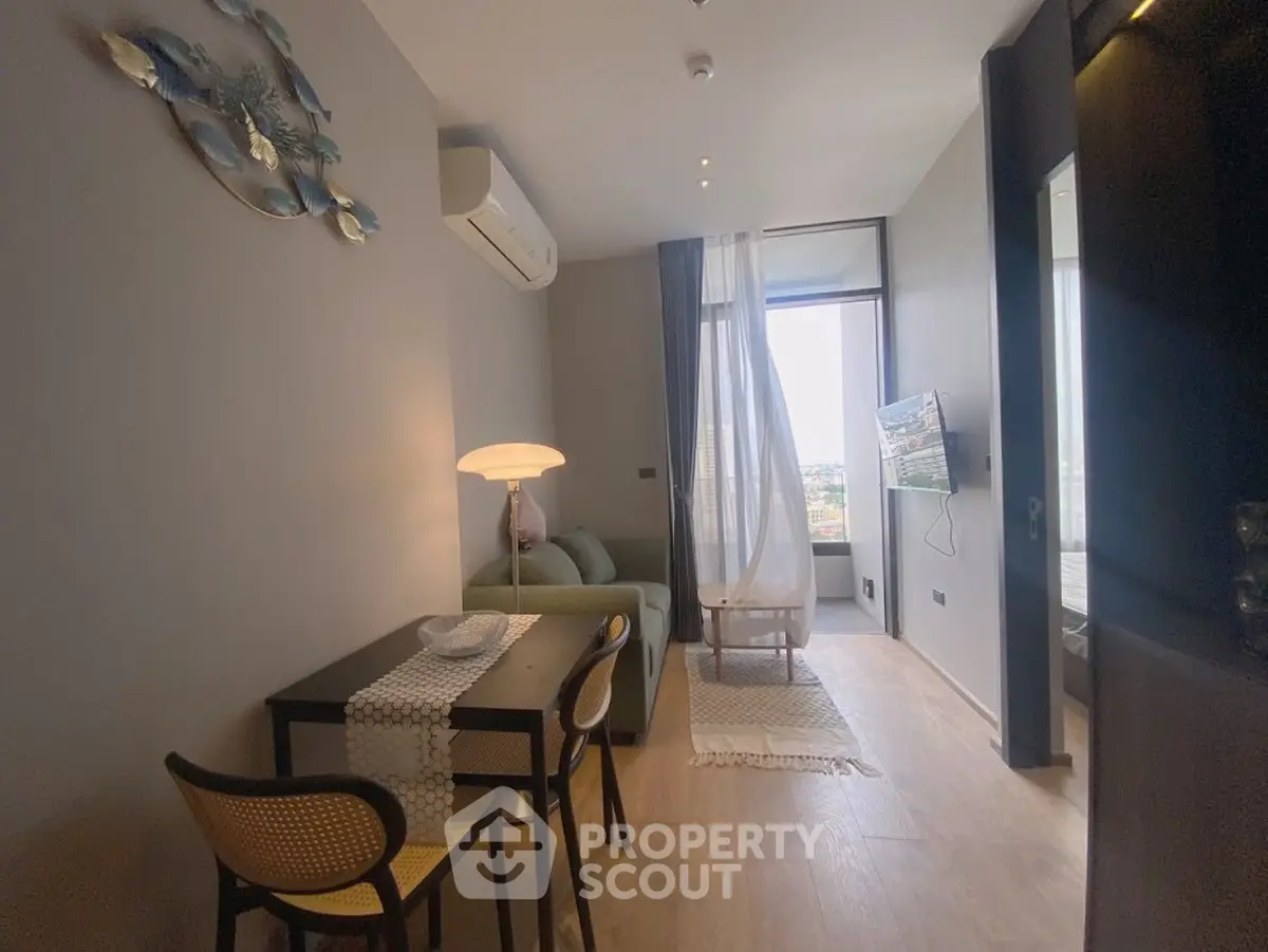 Cozy modern living room with stylish decor and city view window