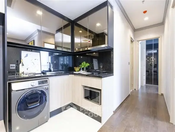 Modern kitchen with sleek appliances and stylish cabinetry