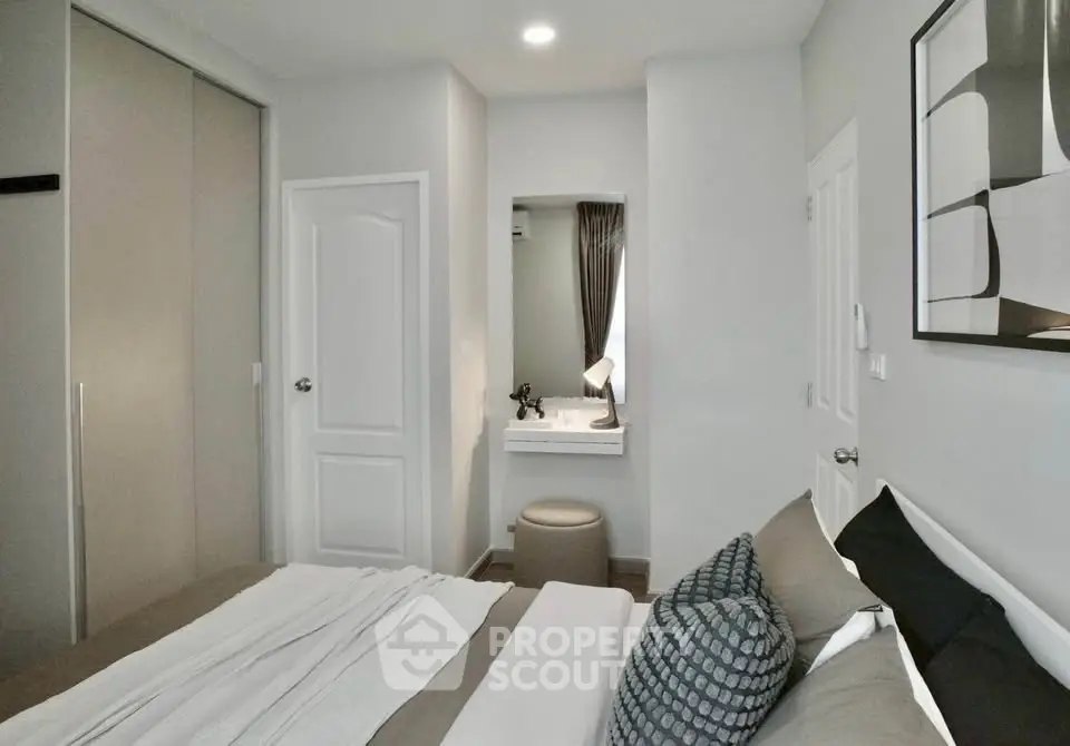 Modern bedroom with stylish decor and cozy ambiance