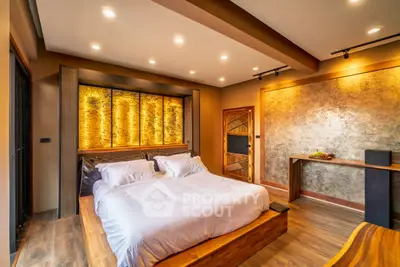 Luxurious modern bedroom with ambient lighting and stylish decor