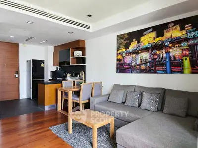 Modern living room with open kitchen and stylish decor