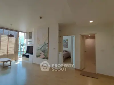 Spacious modern living room with natural light and stylish decor