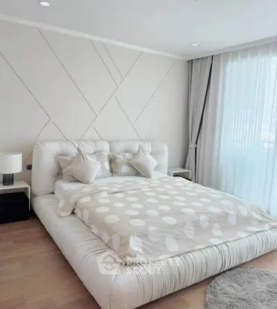 Luxurious modern bedroom with elegant decor and natural light