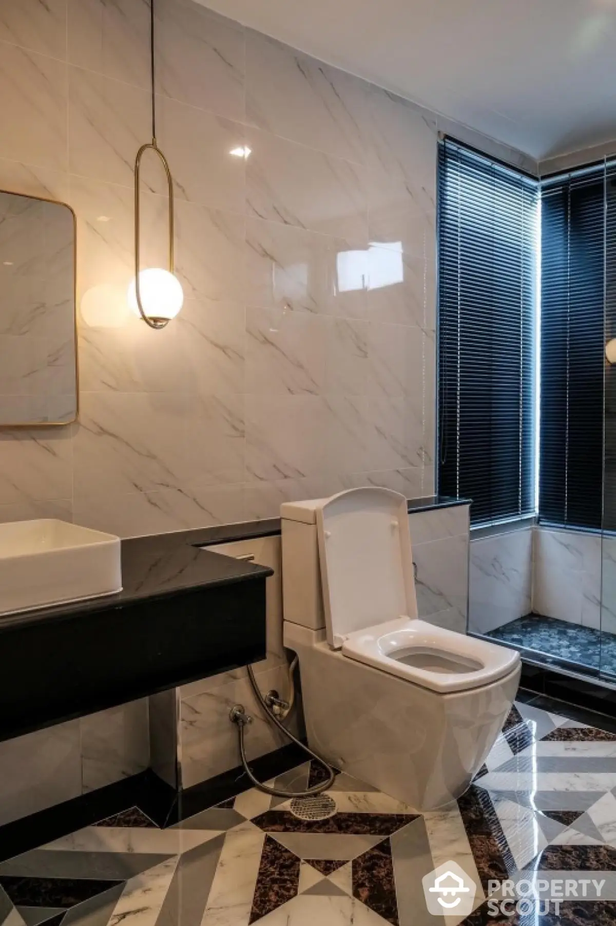 Luxurious modern bathroom with elegant marble tiles and stylish fixtures