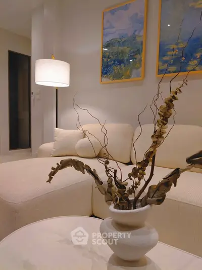 Elegant living room with modern decor and cozy lighting