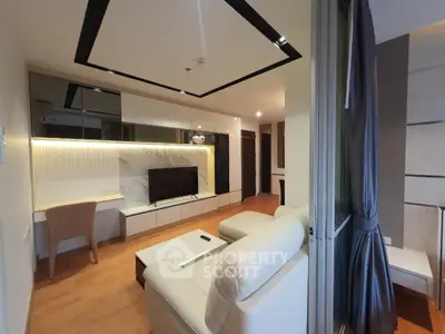Modern living room with sleek design and cozy seating area