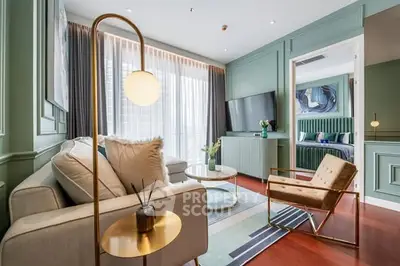 Stylish modern living room with elegant decor and cozy seating area.
