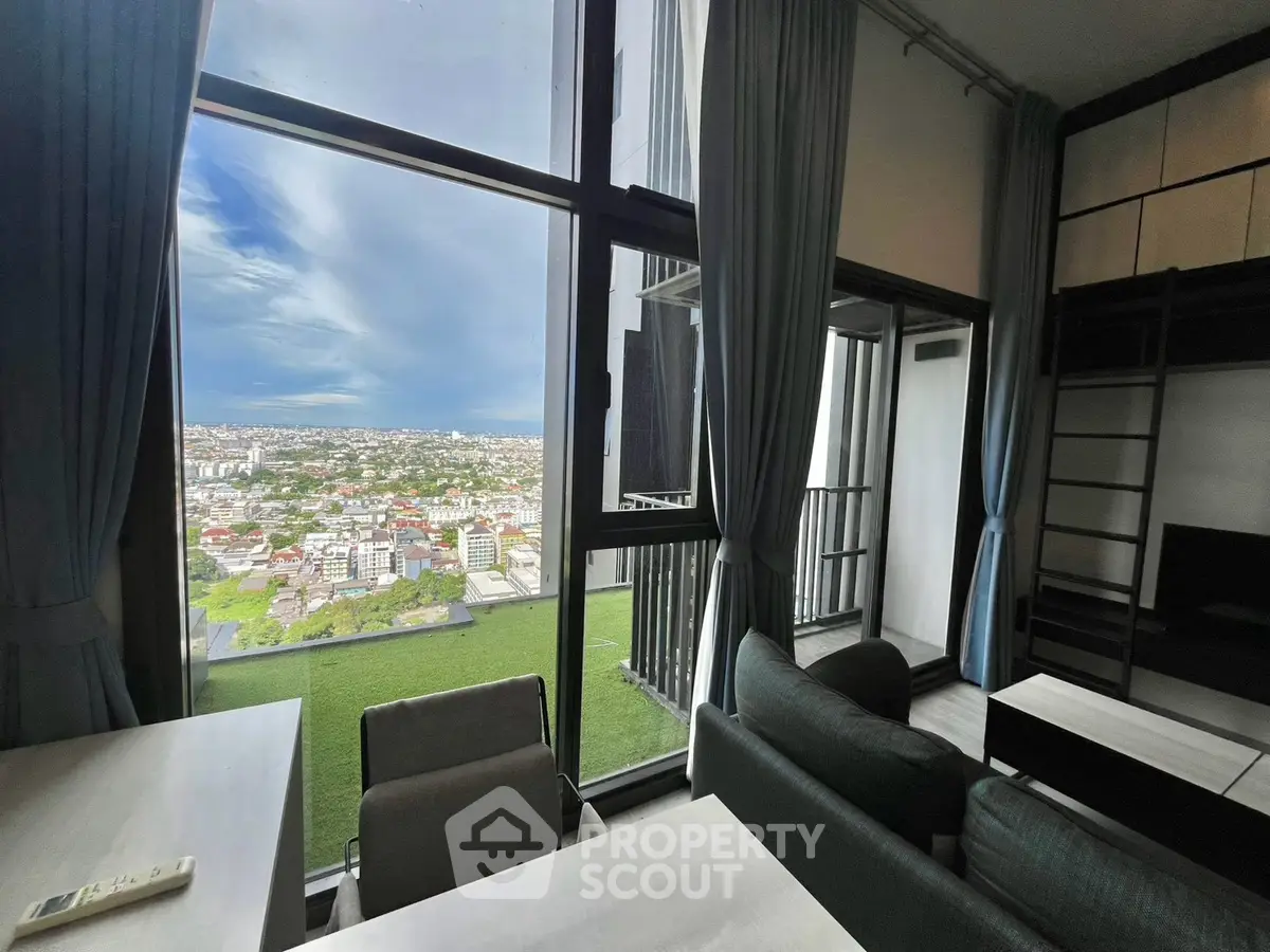 Stunning high-rise apartment with panoramic city view and modern interior design.