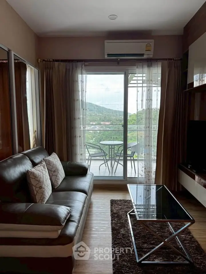Chic living room with mountain view and modern balcony access