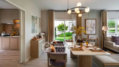 Modern open-plan living and dining area with stylish decor and garden view.