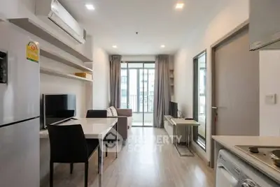 Modern apartment living room with sleek furniture and natural light