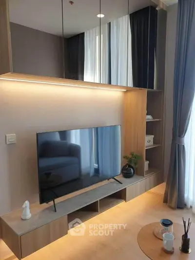 Modern living room with sleek TV setup and stylish decor