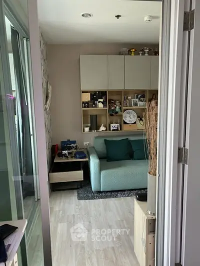Cozy living room with modern decor and stylish shelving unit