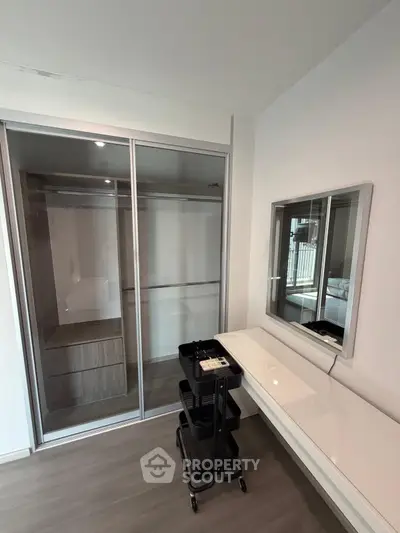 Modern storage room with sleek sliding doors and minimalist design