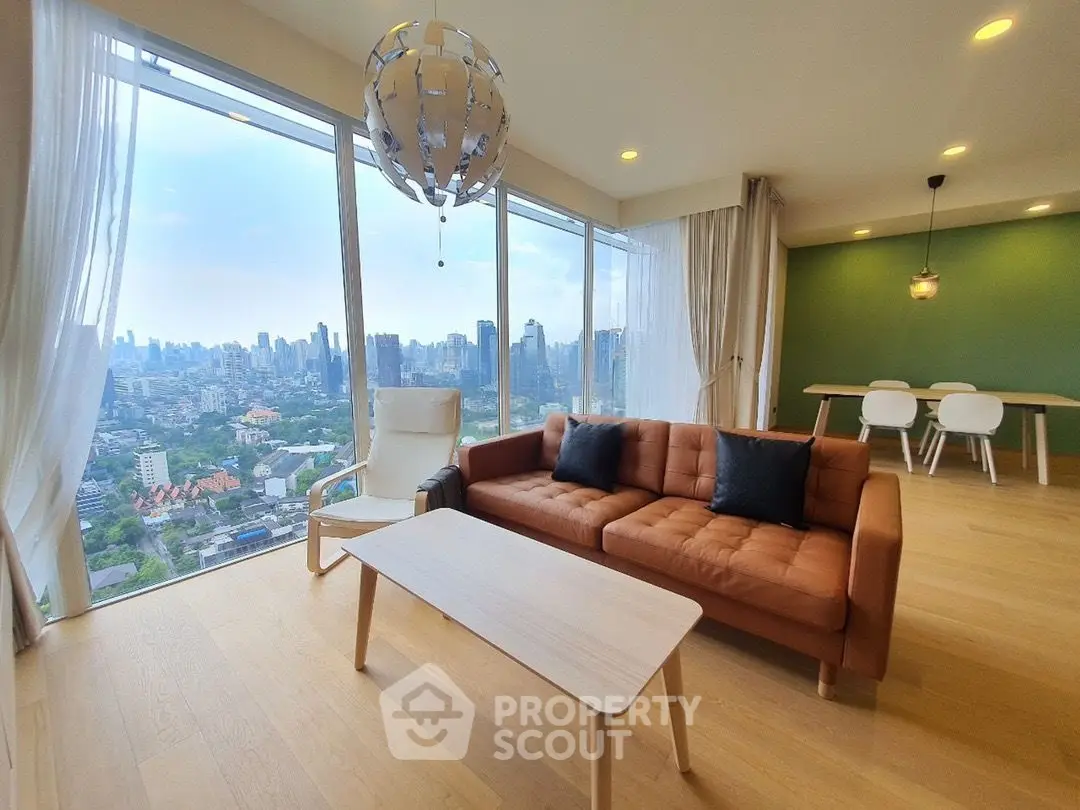 Spacious living room with panoramic city view and modern decor