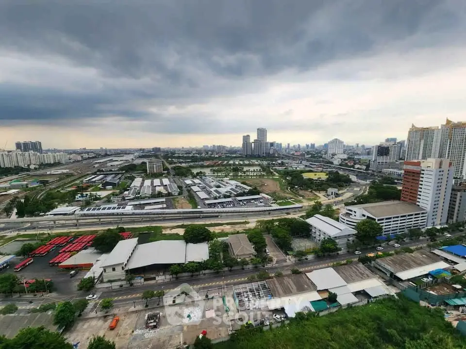 Stunning cityscape view from high-rise building showcasing urban development and skyline.