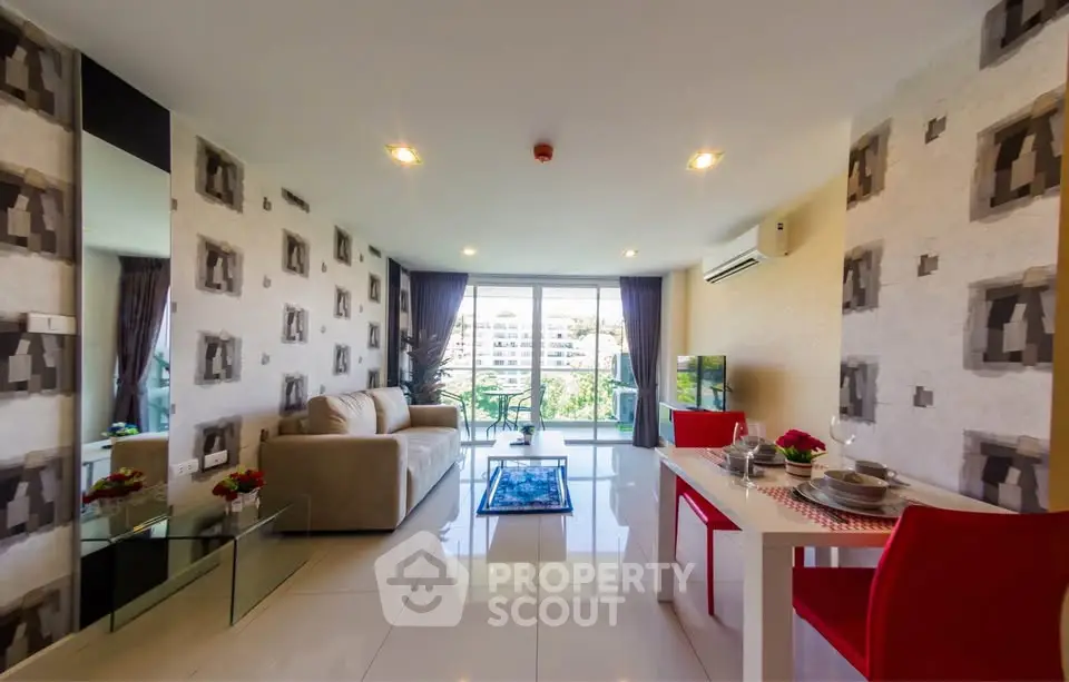 Modern living room with stylish decor and balcony view
