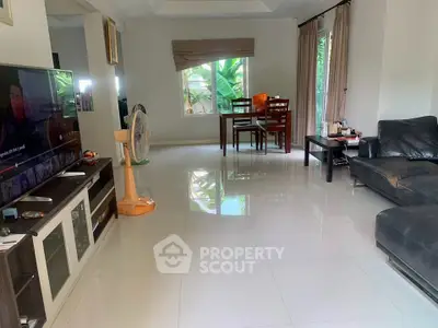 Spacious living room with modern furniture and natural light