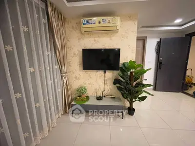 Modern living room with wall-mounted TV and elegant decor