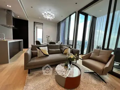 Luxurious modern living room with floor-to-ceiling windows and stunning city view.