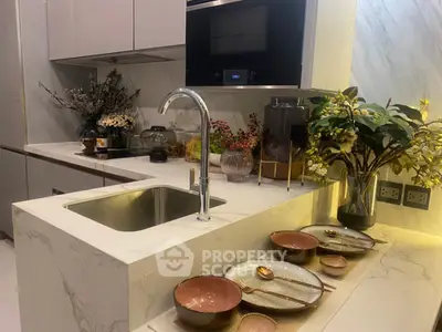 Modern kitchen with elegant marble countertops and stylish decor