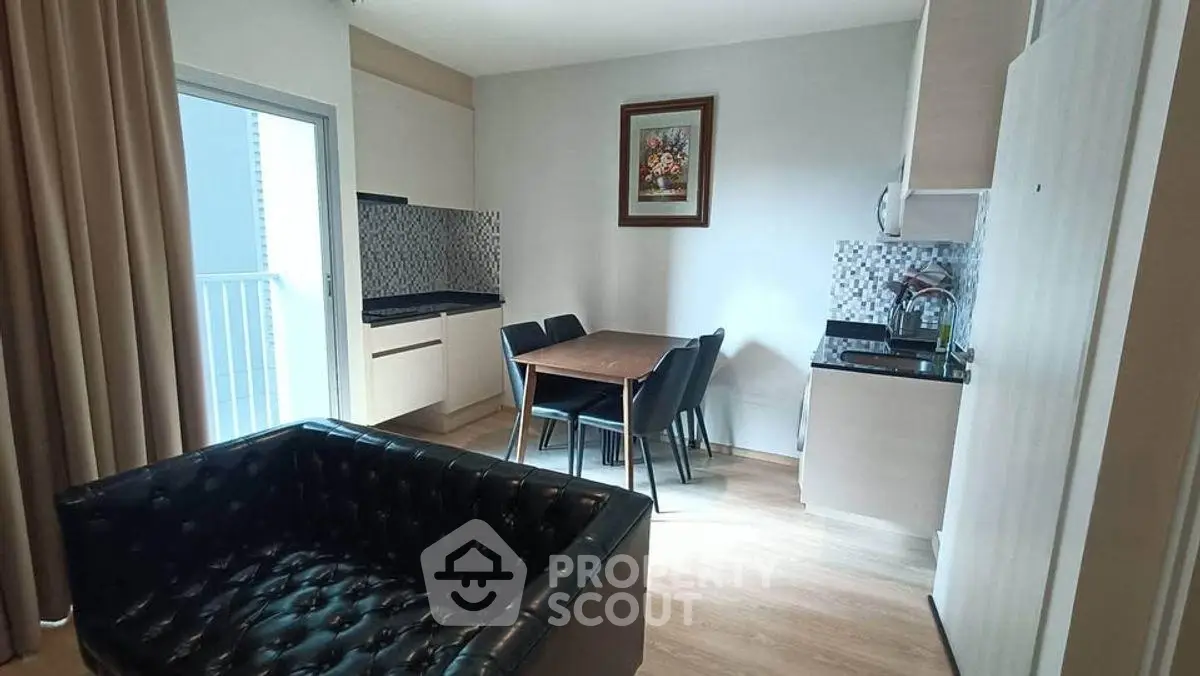 Modern apartment living room with stylish furniture and dining area