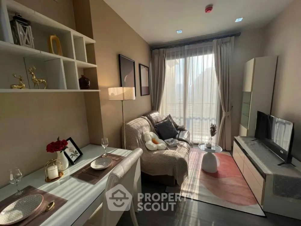 Cozy living room with elegant decor and natural light, perfect for relaxation and entertainment.