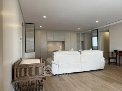 Spacious modern living room with elegant furniture and open layout