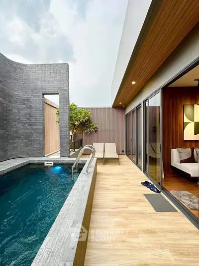Luxurious modern home with private pool and stylish patio area, perfect for relaxation and entertainment.
