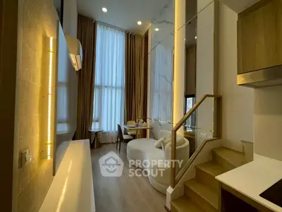 Modern duplex living room with high ceilings and elegant decor