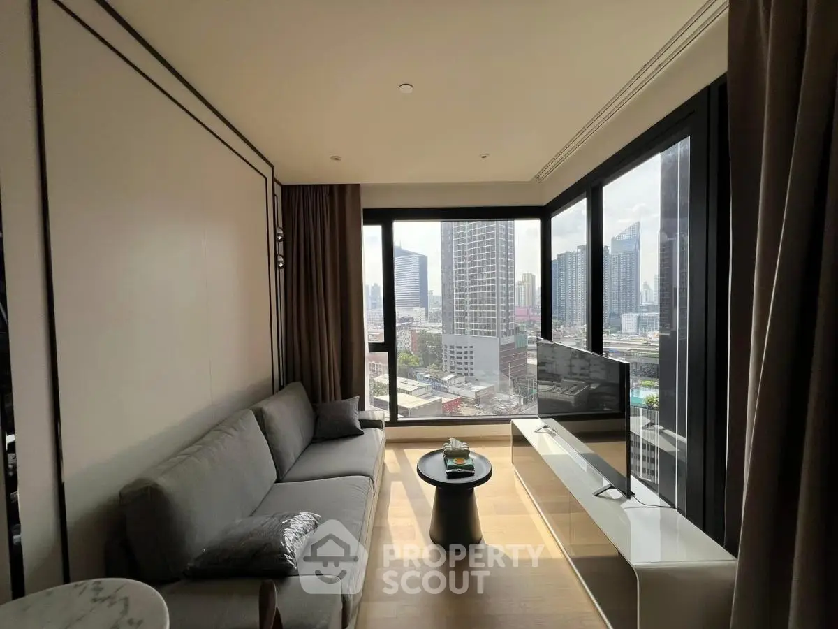 Modern living room with panoramic city view and sleek furniture