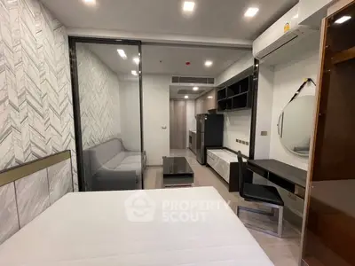 Modern studio apartment with stylish decor and compact layout