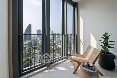 Modern balcony with stunning city view and stylish furniture