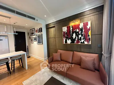 Modern living room with stylish decor and open kitchen layout