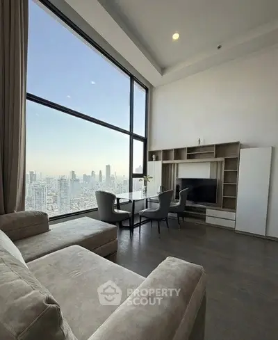 Luxurious living room with panoramic city view and modern furnishings