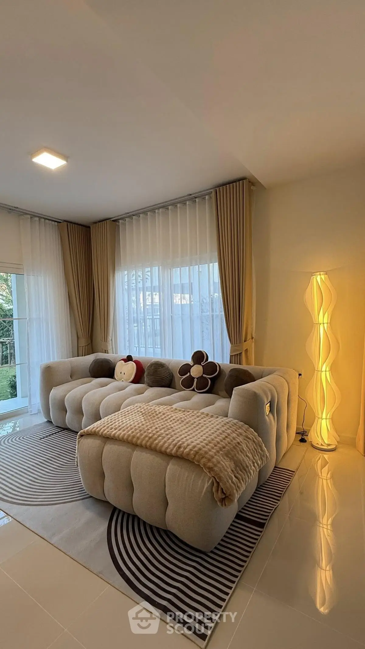 Luxurious living room with plush seating and modern decor