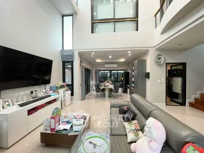 Spacious modern living room with high ceilings and elegant decor