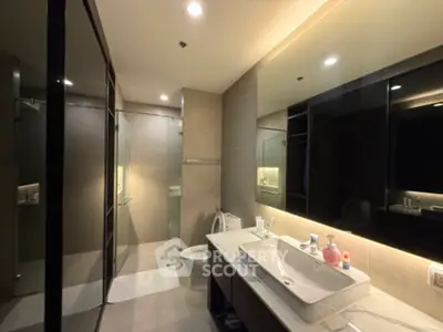 Modern bathroom with sleek design and ambient lighting