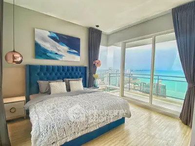 Luxurious bedroom with stunning ocean view and modern decor