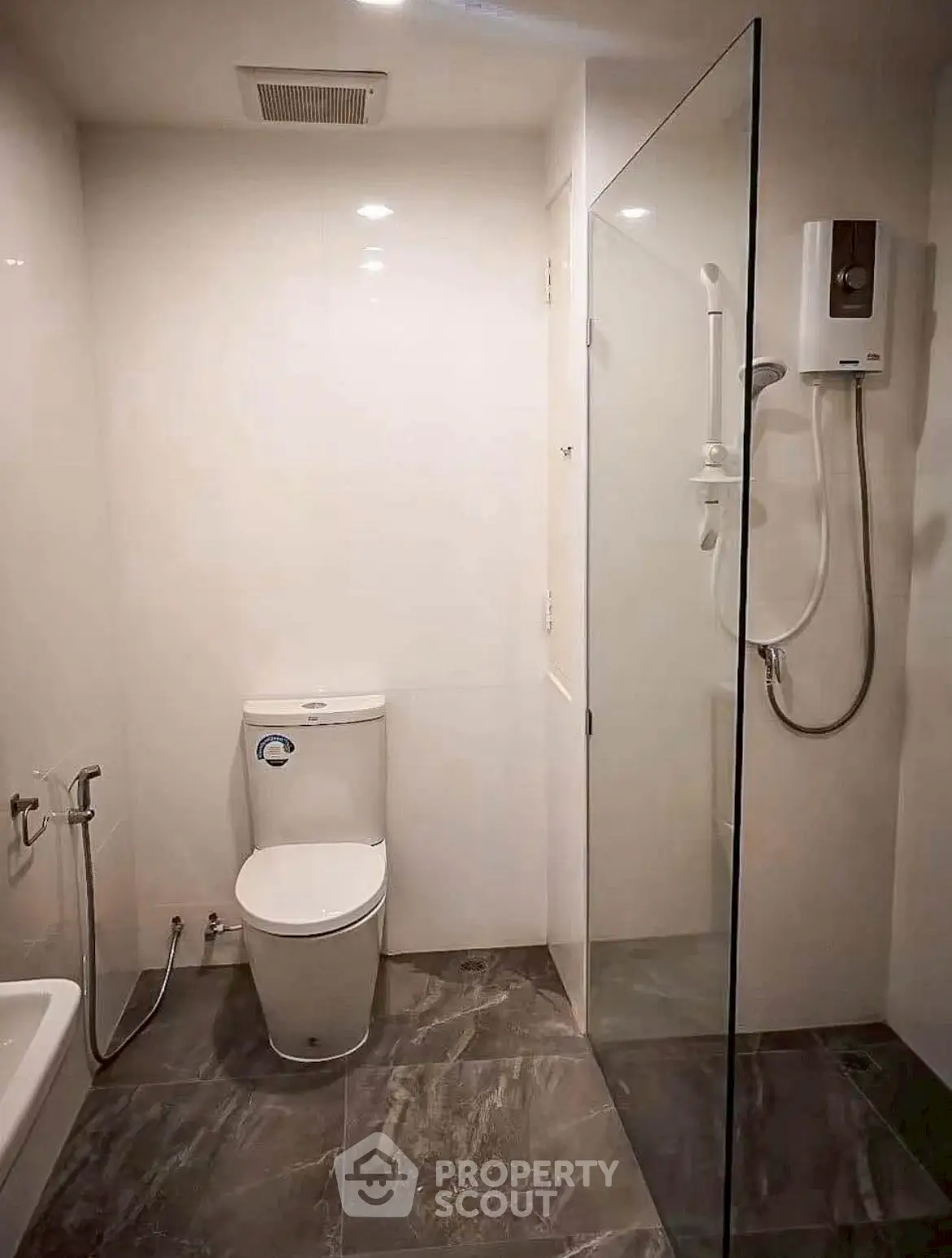 Modern bathroom with glass shower and sleek fixtures