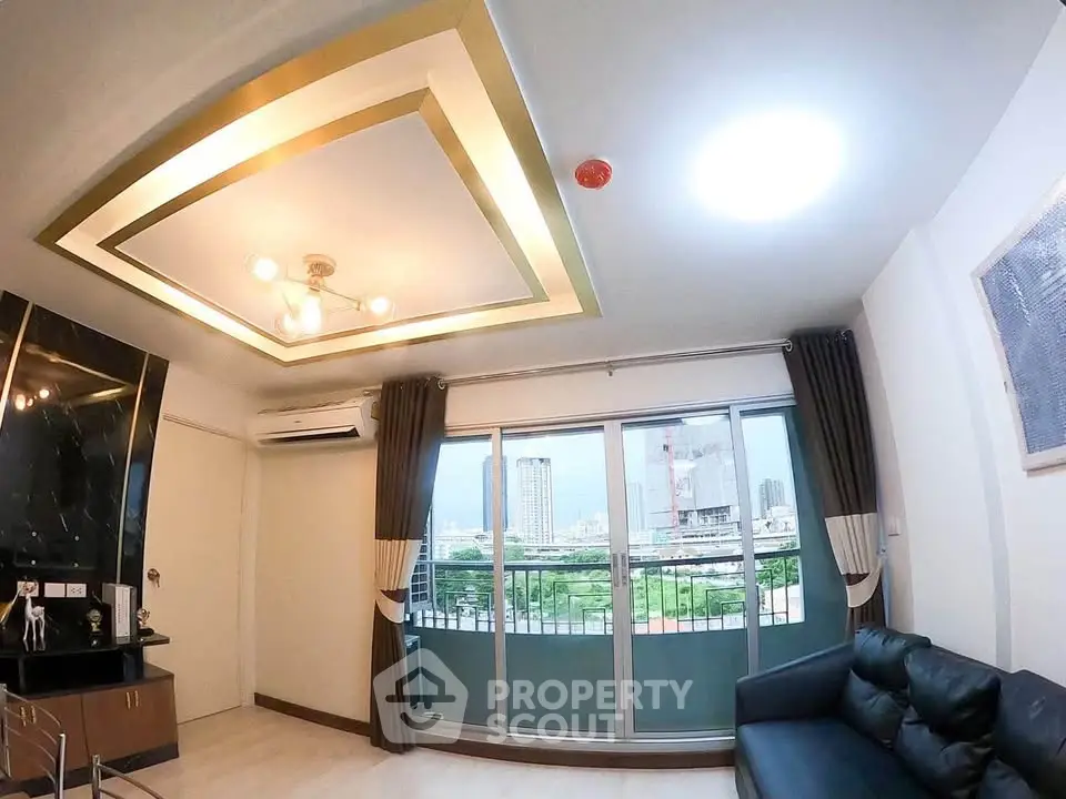Modern living room with stylish ceiling design and city view through large windows.