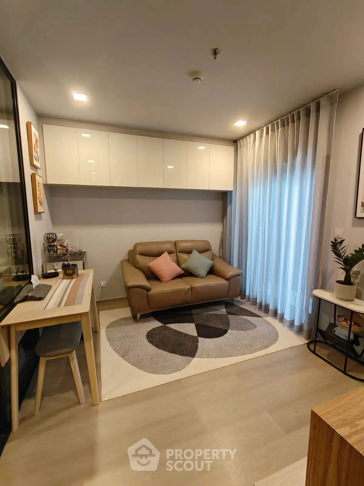 Modern living room with stylish decor and cozy seating area
