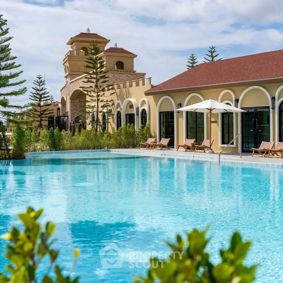 Luxurious villa with stunning pool and elegant architecture in serene setting.