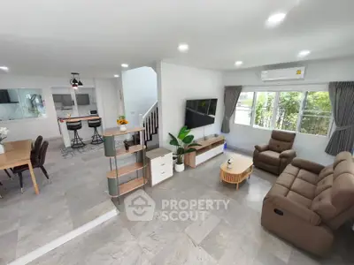 Spacious modern living room with open layout and stylish furniture