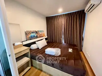 Cozy bedroom with modern decor and ample natural light