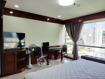 Spacious bedroom with city view and modern furnishings