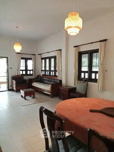 Spacious living room with elegant furniture and natural light